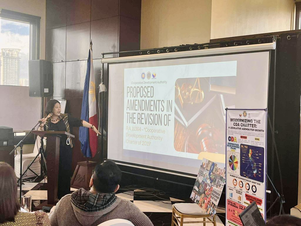 The Deputy Administrator for Legal Affairs Service presents the CDA’s proposed legislative agenda at DTI’s LEGIS20C, with the agency’s vision board and award-winning infographic on full display.